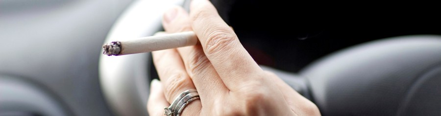 Driver smoking a cigarette