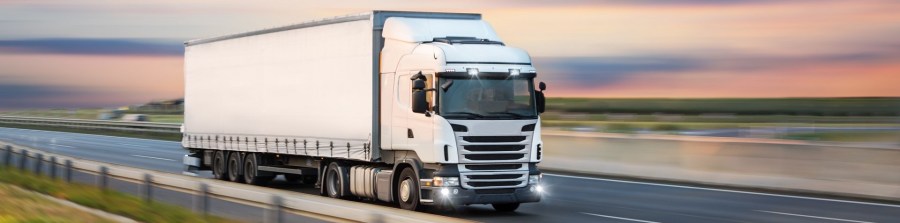 Truck with container on road, cargo transportation concept.